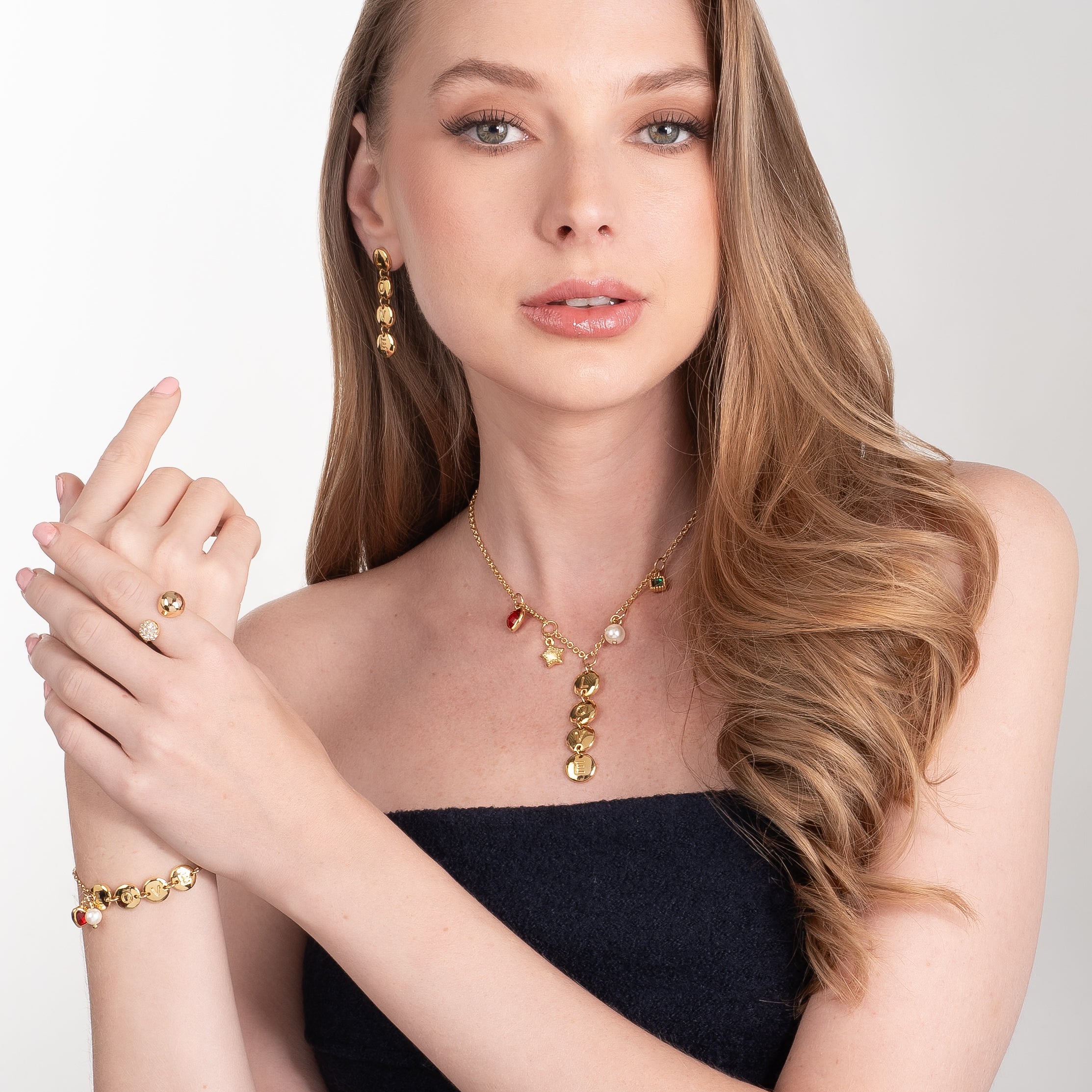 Gold plated open ring polished and brilliant sphere design