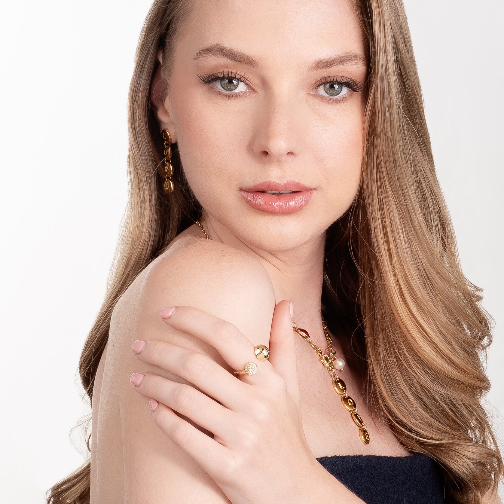 Gold plated open ring polished and brilliant sphere design