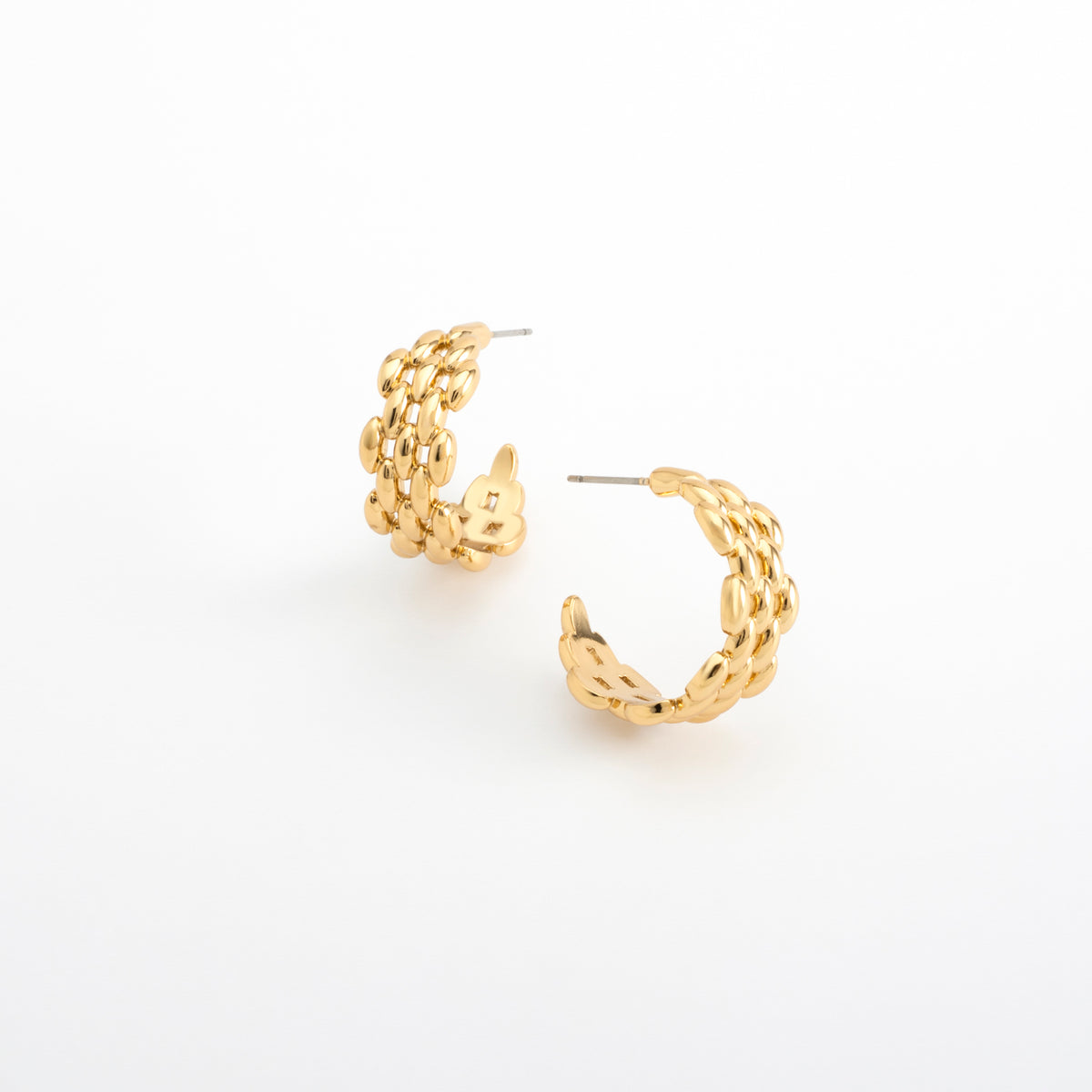 Aretes argolla en baño de oro diseño tejido pulido
