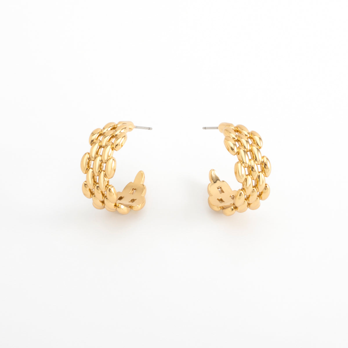 Aretes argolla en baño de oro diseño tejido pulido