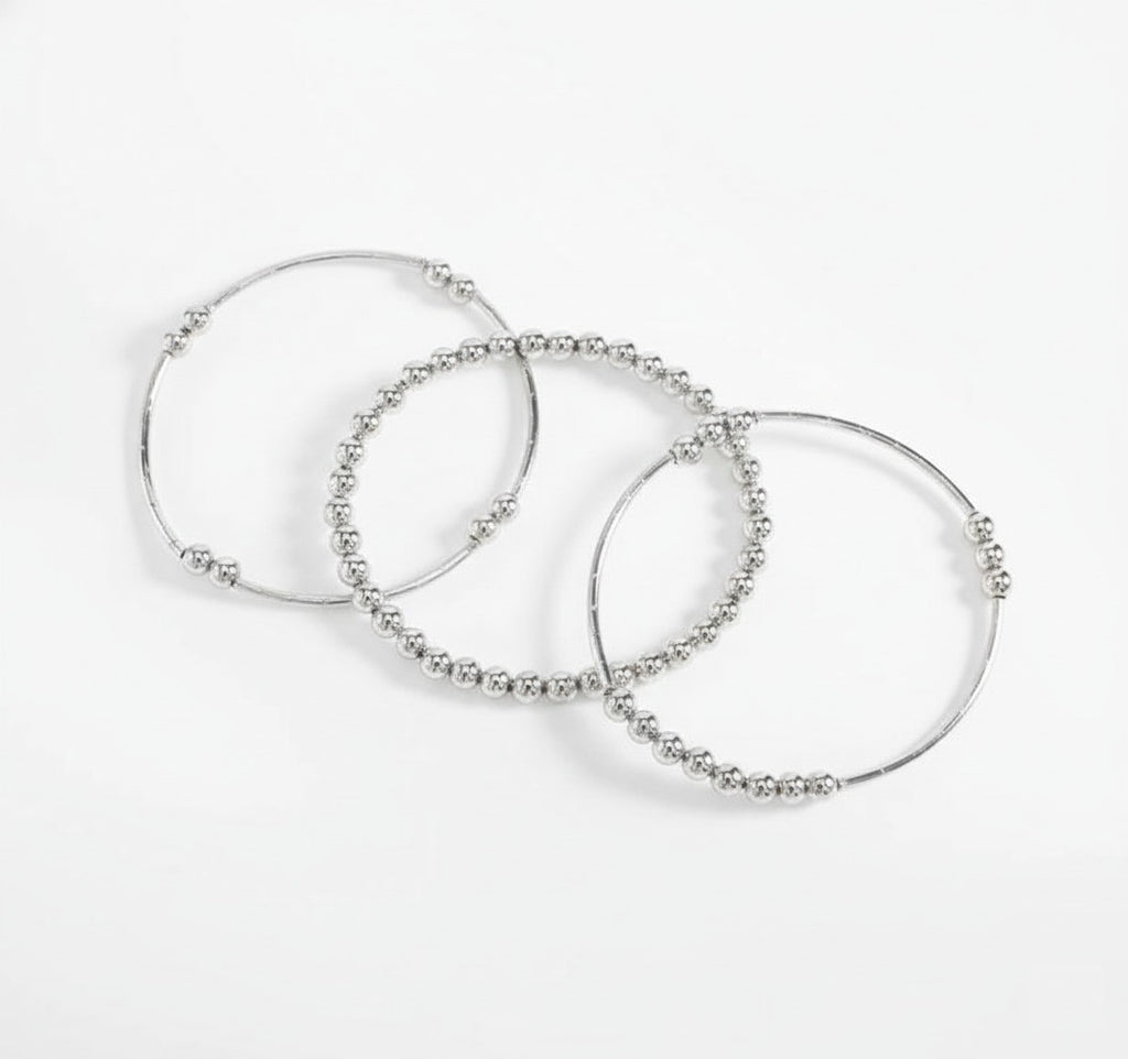 Platinum plated bracelet with polished spherical beads design