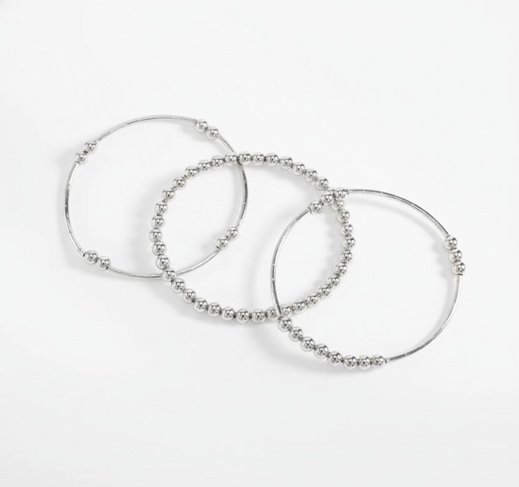 Pulsera en baño de platino con cuentas esféricas pulidas