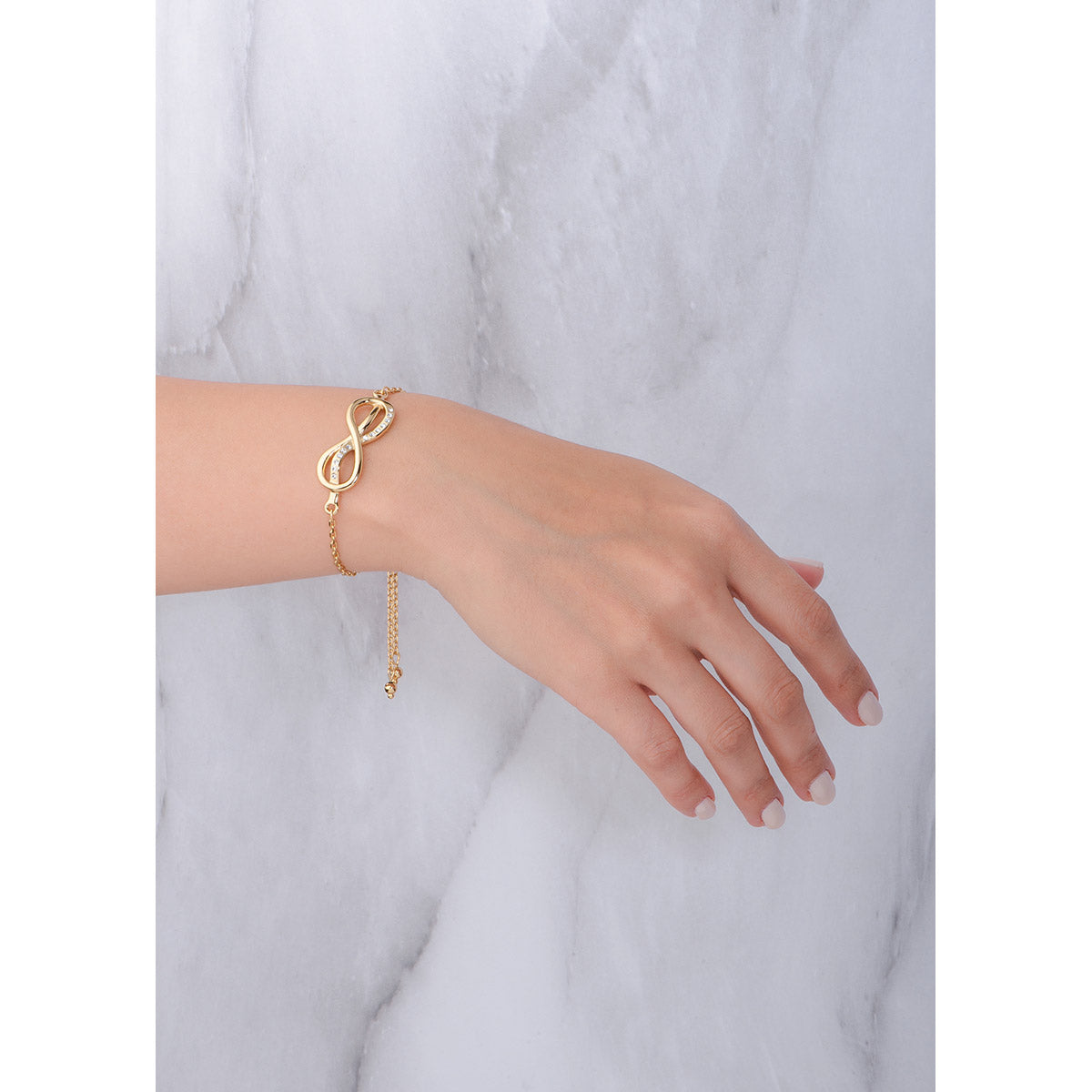 PULSERA EN BAÑO DE ORO AJUSTABLE CON PIEDRAS DE CRISTAL