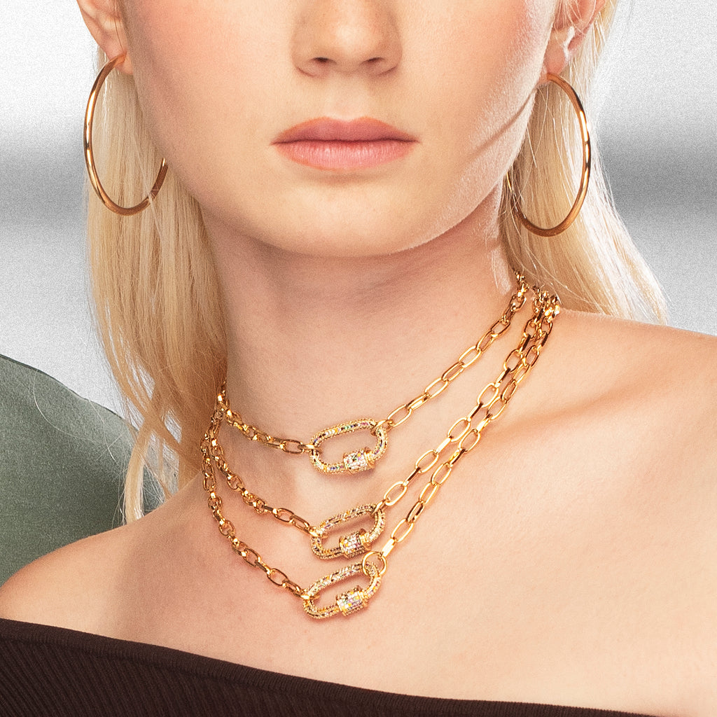 Large gold-plated hoop earrings.