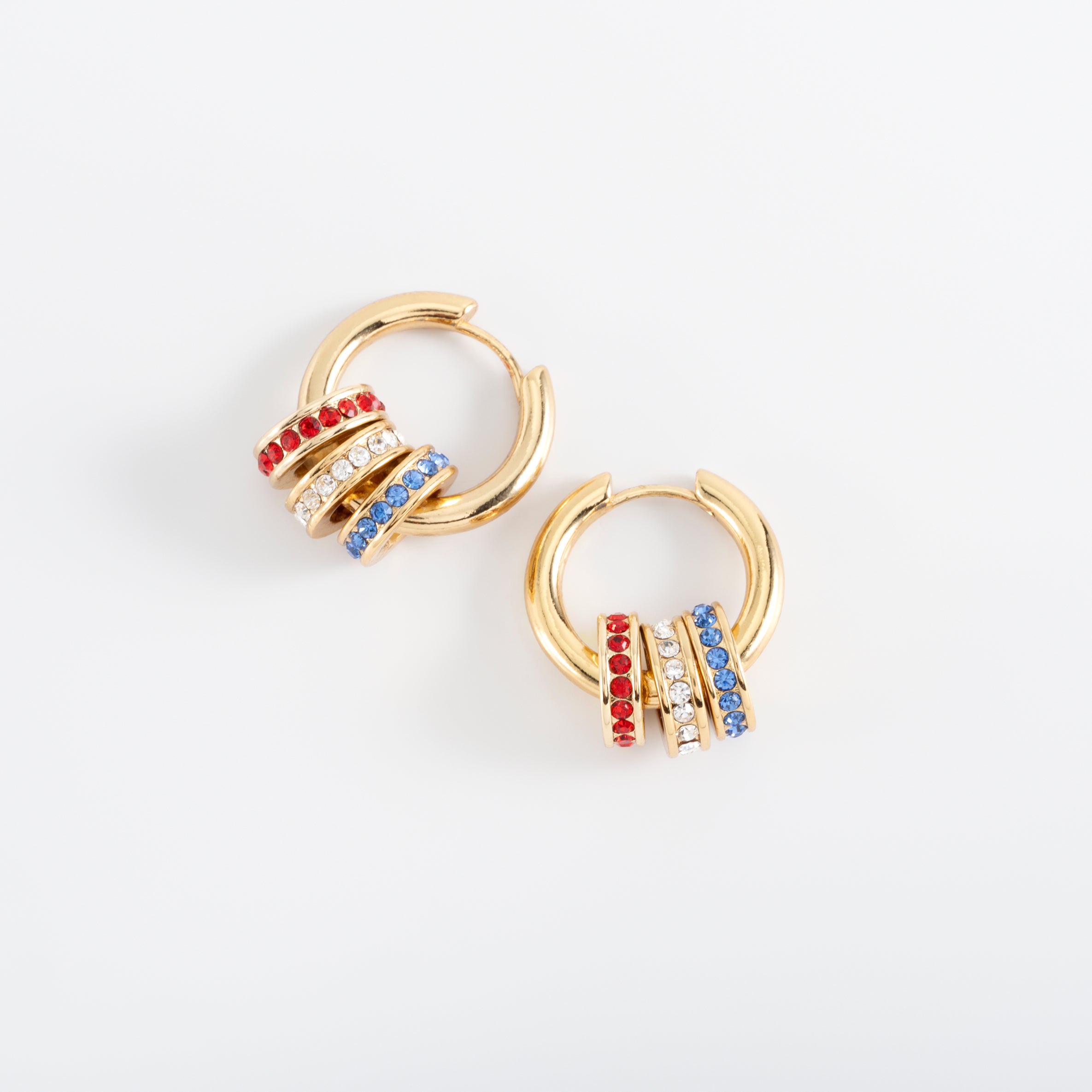 USA. Gold-plated earrings with multicolored charms.