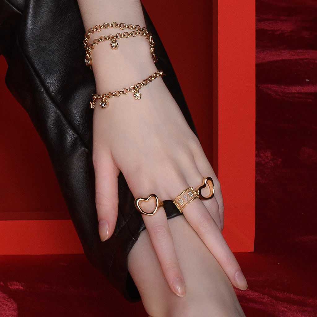 Gold plated ring cutout design brilliant touch stones